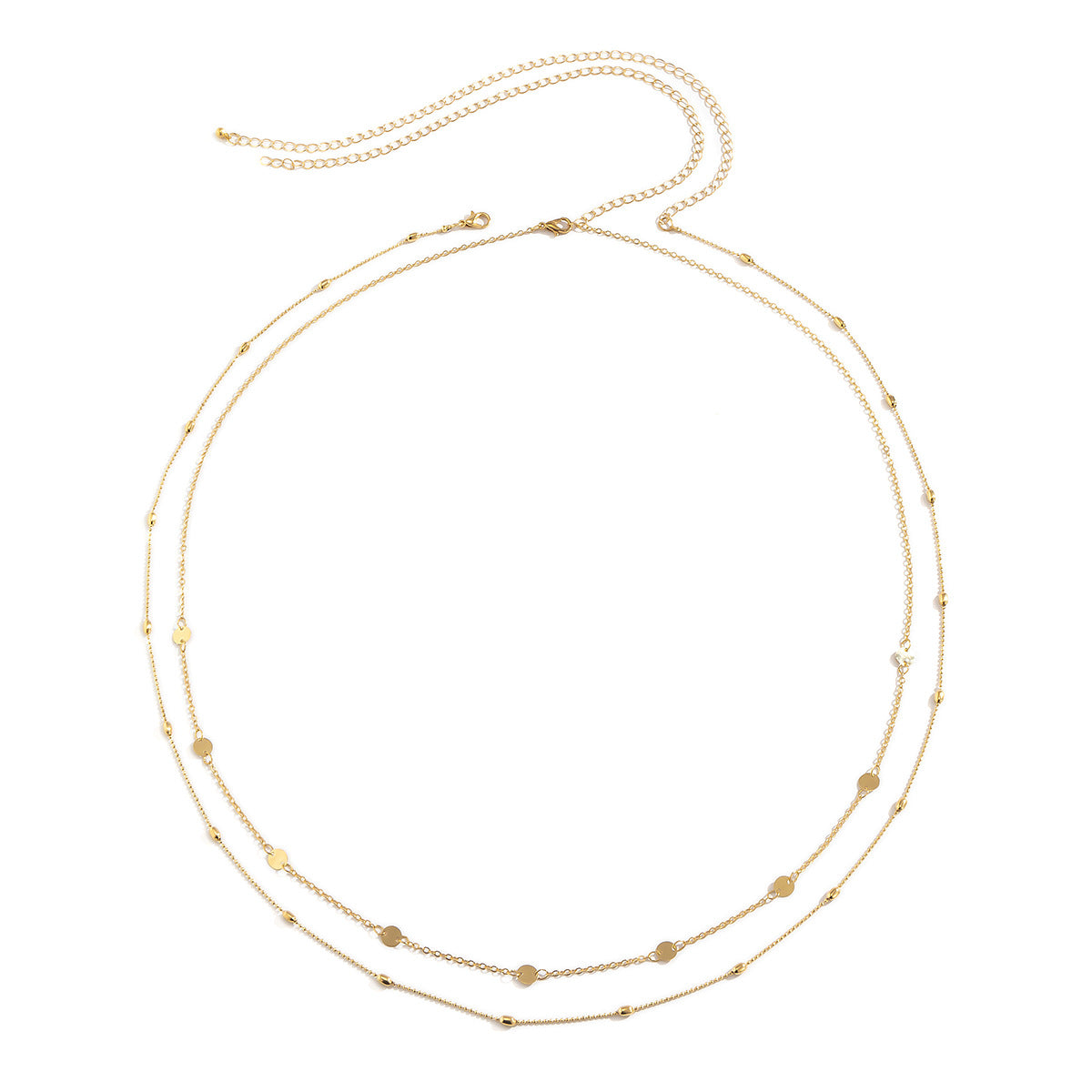 Gold necklace with small beads on a white background